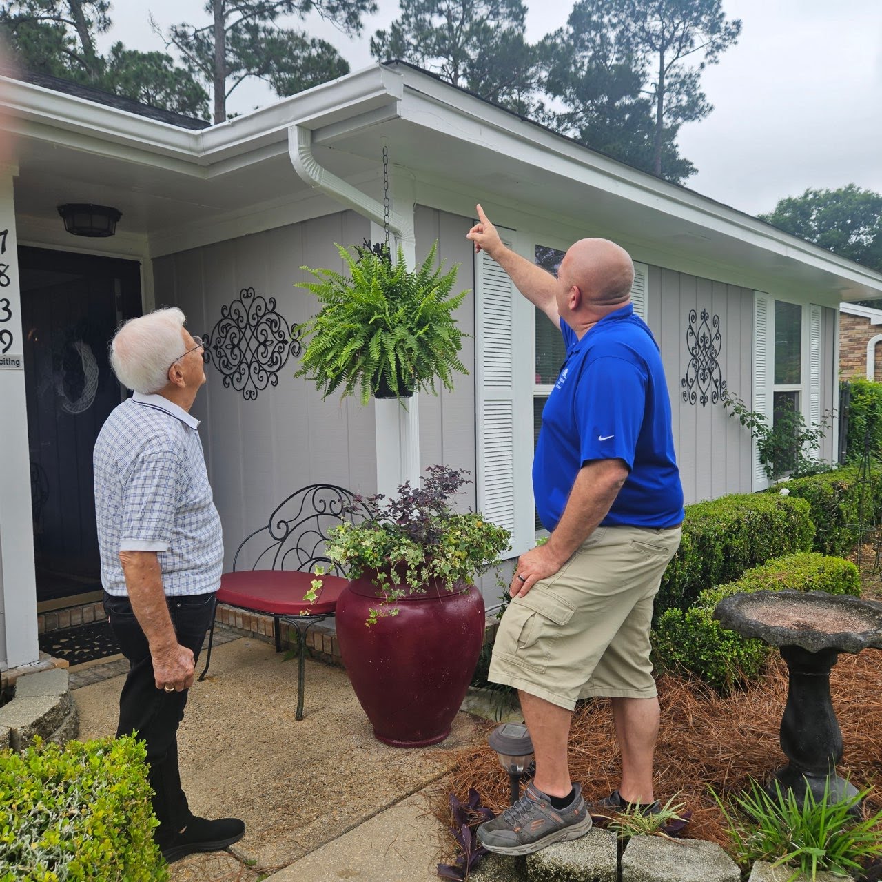 Sean Anderson explaining inspection findings to a homeowner